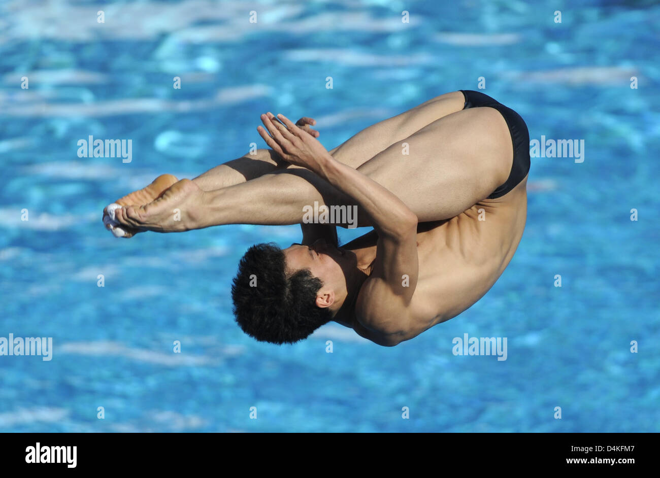 China?s Xinhua Zhang dives off the 1m board at the 13th FINA World ...
