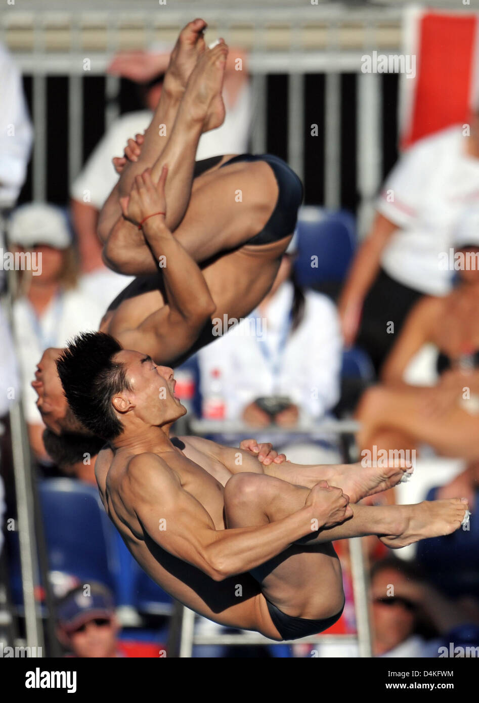 China?s Kai Qin (front) and Feng Wang dive off the 3m board at the 13th ...