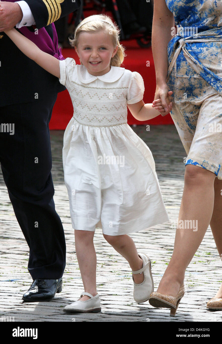 Belgian Prince Laurent (L) is pictured with Princess Claire (R) and her  daughter Princess Louise on the podium during the military parade on the  occasion of Belgium?s National Day in Brussels, Belgium