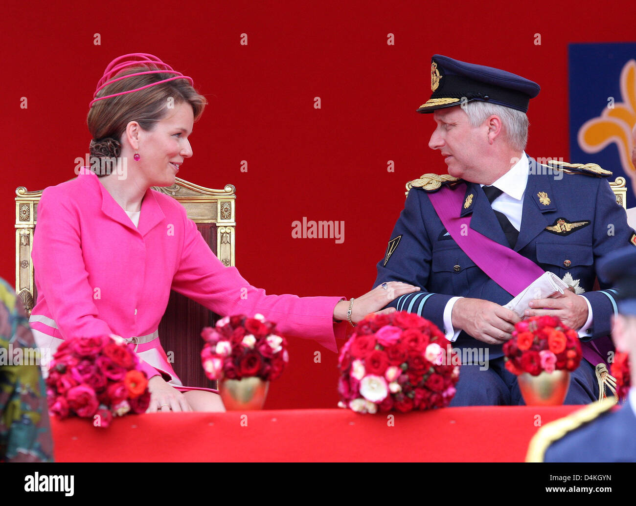 Belgian Prince Laurent (L) is pictured with Princess Claire (R) and her  daughter Princess Louise on the podium during the military parade on the  occasion of Belgium?s National Day in Brussels, Belgium