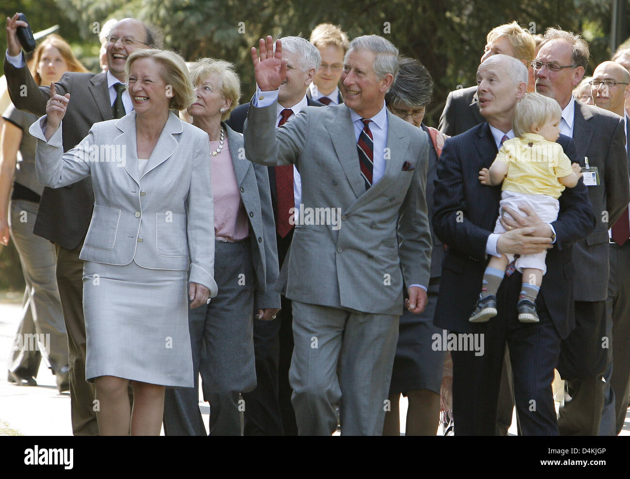 Britain?s Prince Charles (C) meets the director of the institute for climate research Hans Joachim Schnellnhuber with his son Zoltan Elias and Brandenburg?s Science Minister Johanna Wanka (L) at the institute?s grounds in Potsdam, Germany, 30 April 2009. The British heir apparent visited a climate protection forum. Charles and his wife Camilla are currently on their first official  Stock Photo