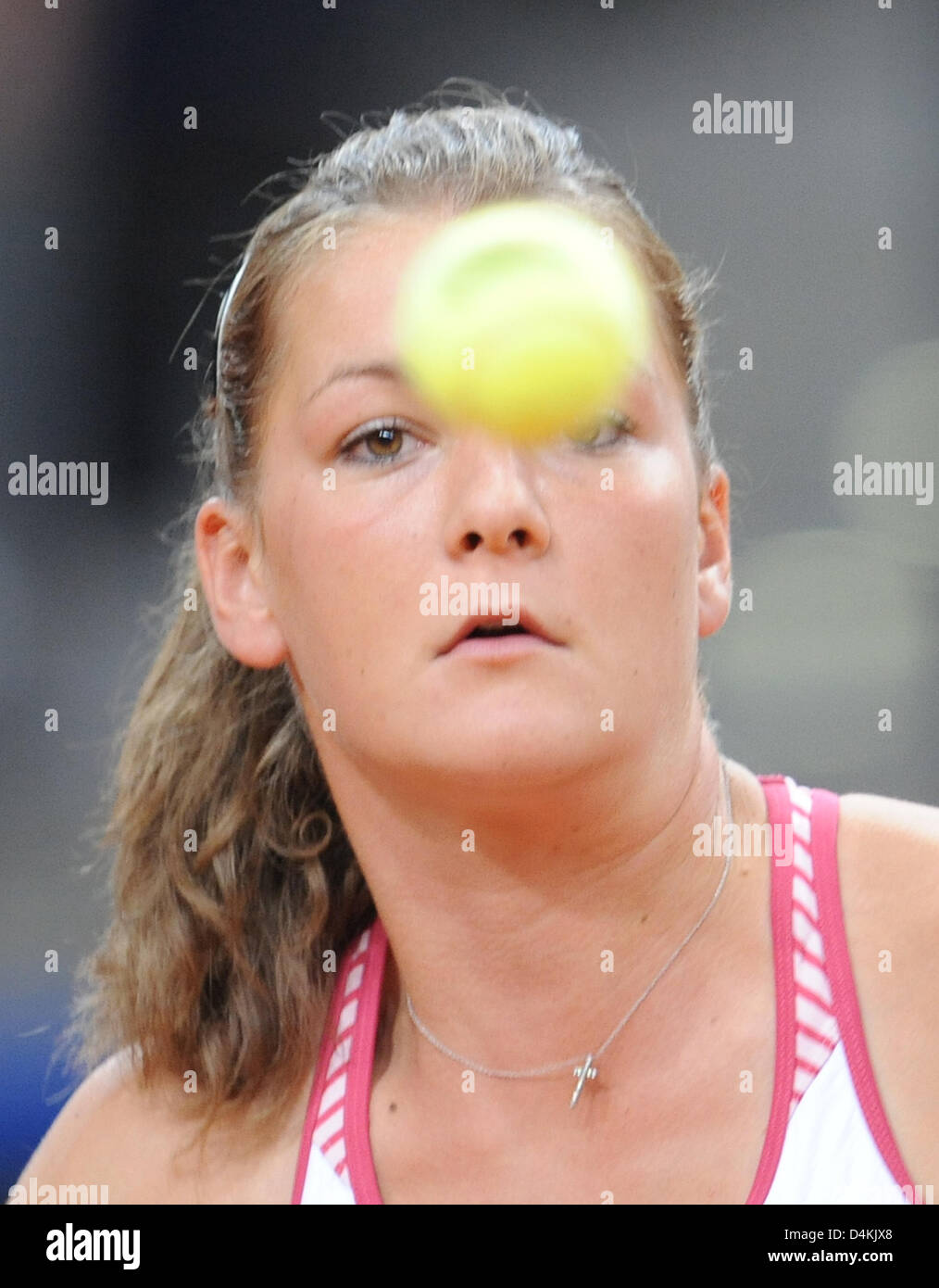 Polish Agnieszka Radwanska focusses the ball during her quarter final