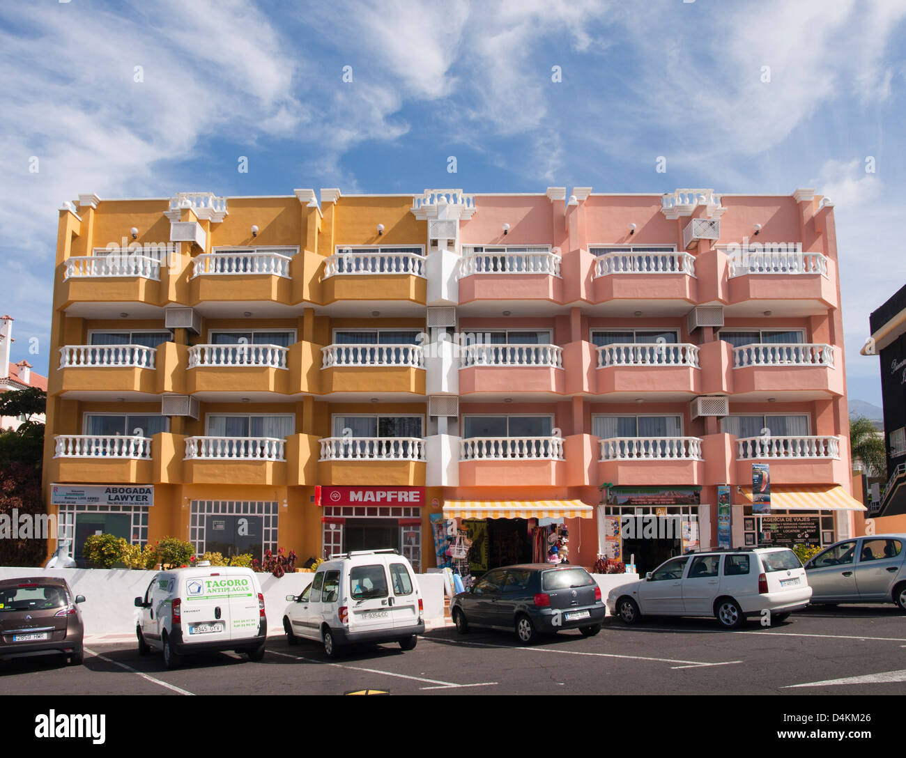 Typical building with holiday apartments and shops on ground floor in Tenerife, Canary Islands Spain Stock Photo