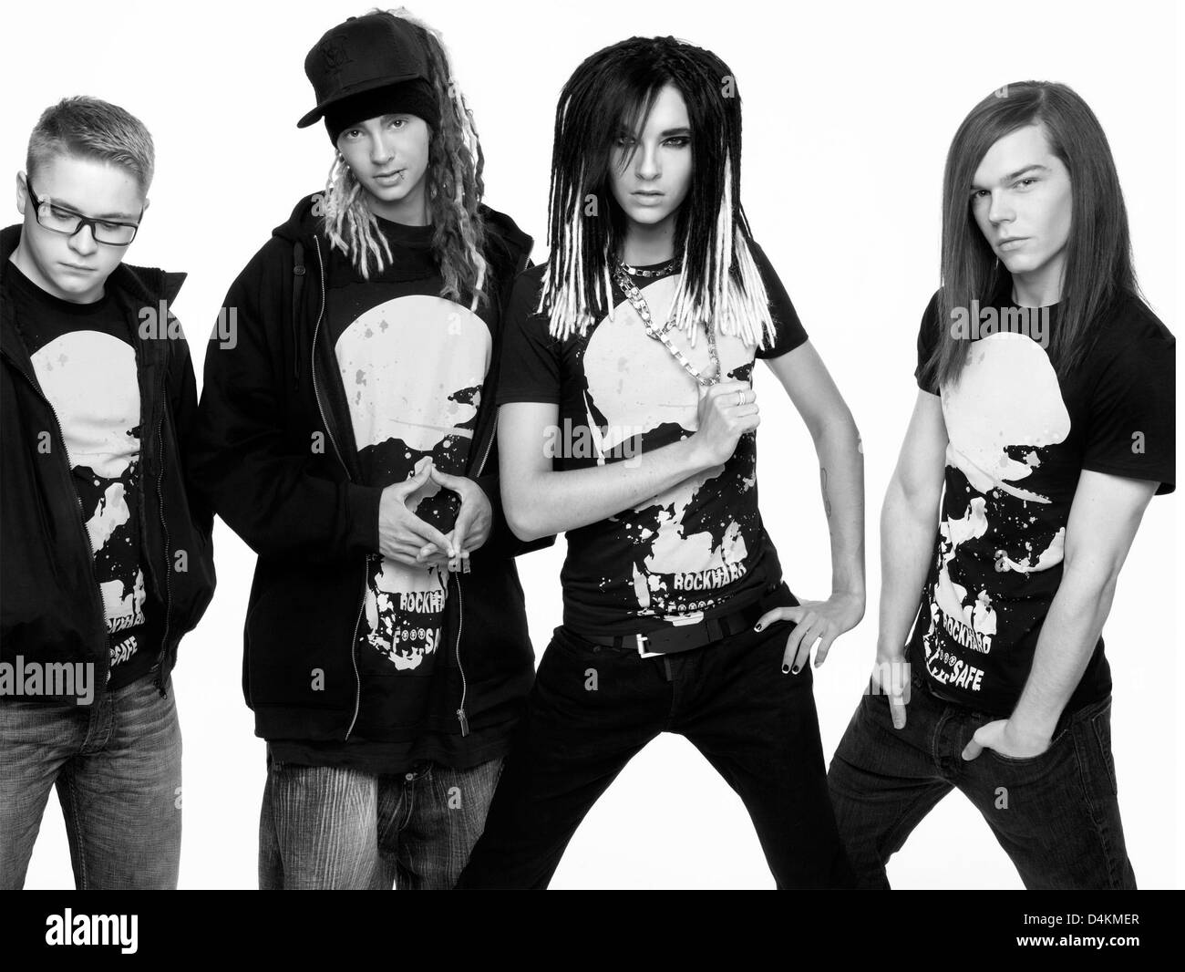 This undated handout picture shows Gustav Schaefer (L-R), Tom Kaulitz, Bill Kaulitz and Georg Listing of the band ?Tokio Hotel? wearing clothes they designed for H&M in Hamburg. The sale of the collection will start on 28 May, the proceeds are to inure to the benefit of AIDS projects. dpa (Attention: Author naming ?H&M/Daniel Jackson? necessary, utilisation in the present version o Stock Photo