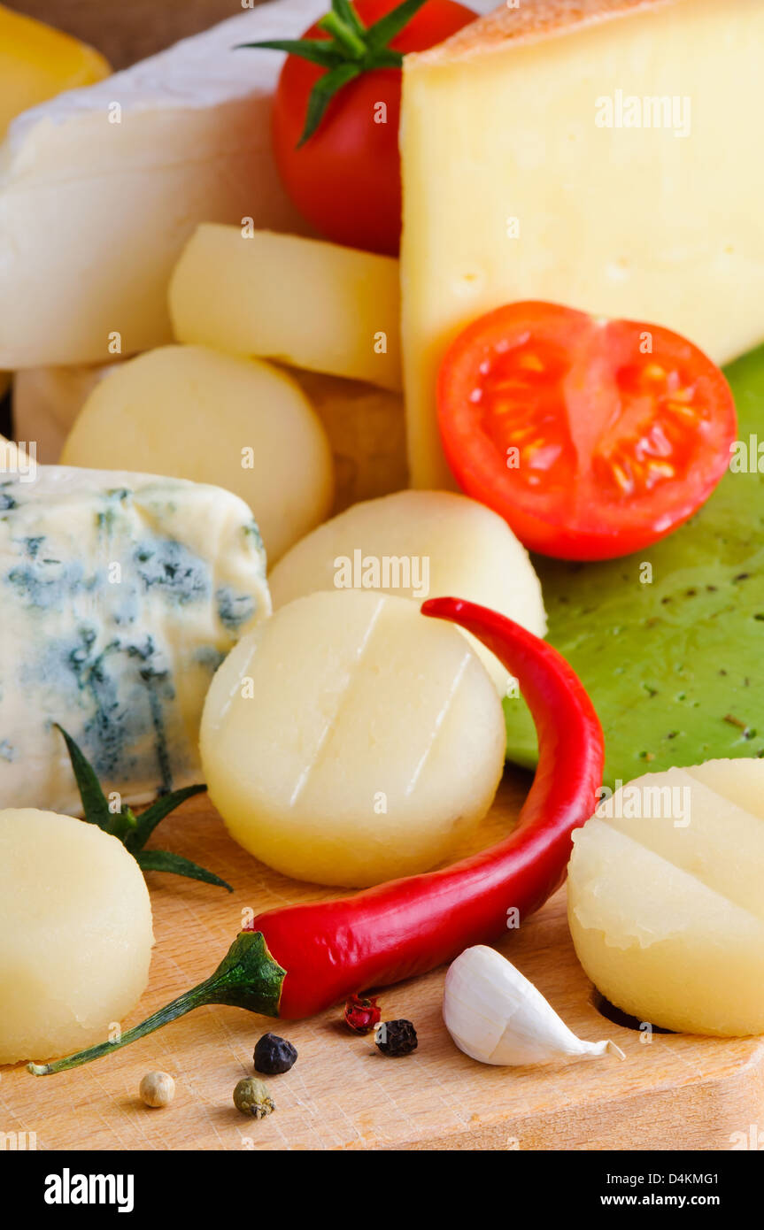 Background with different cheese and spices Stock Photo