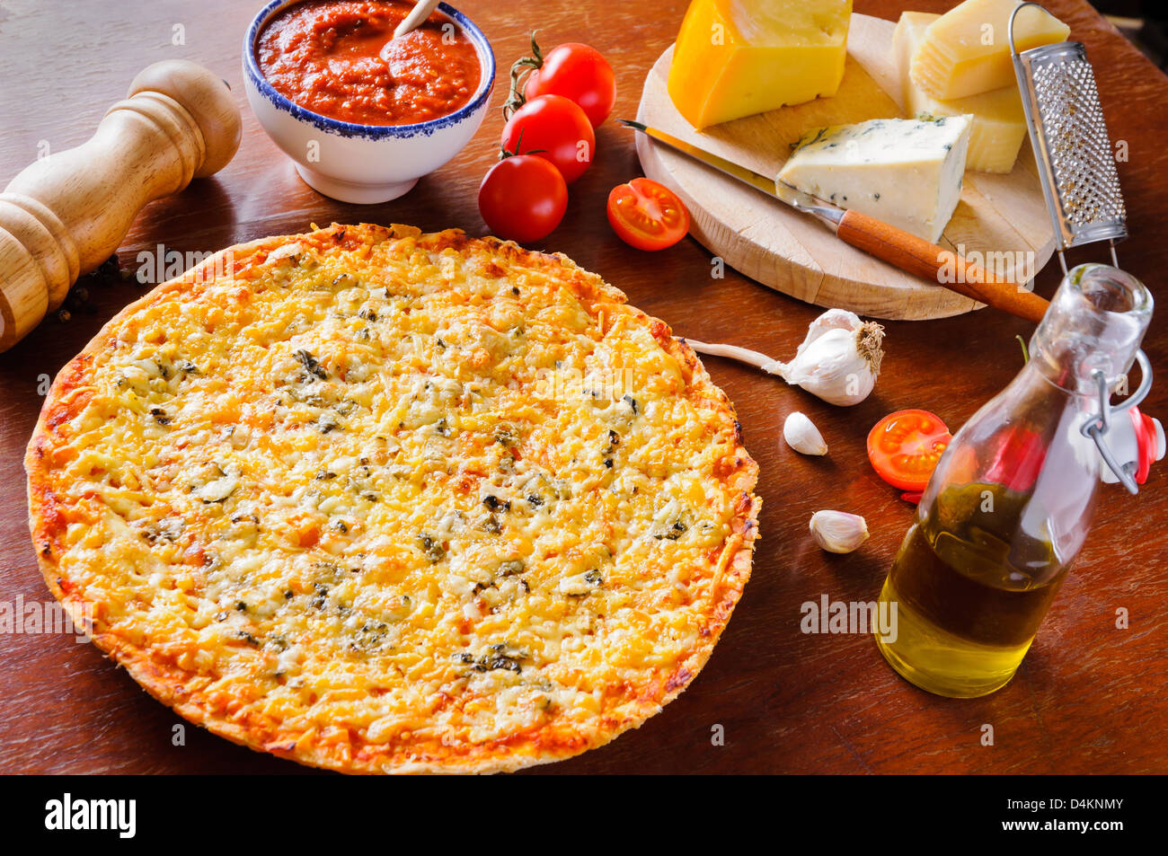 Traditional italian cheese pizza with ingredients Stock Photo