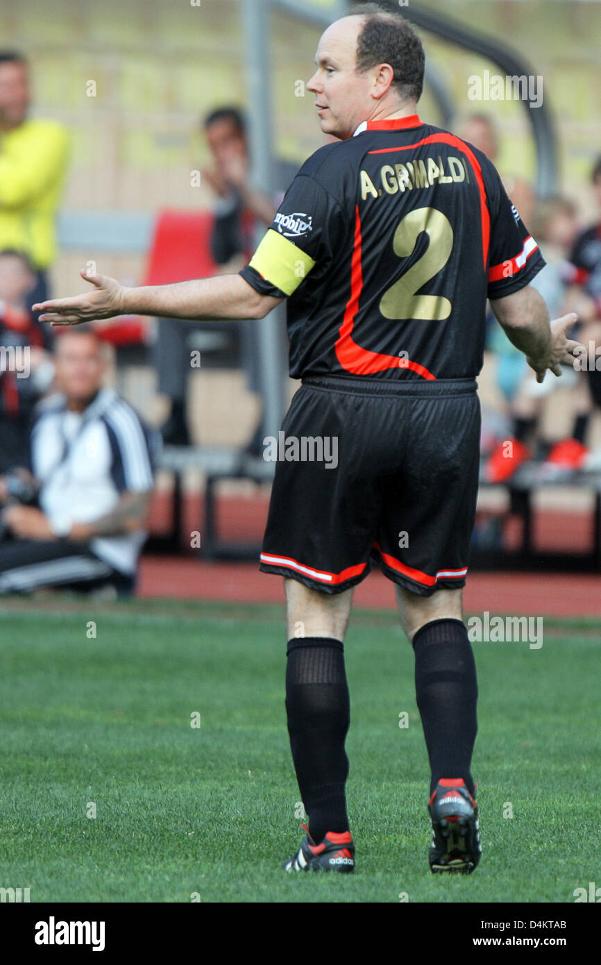 Prince Albert II of Monaco reacts during a charity soccer match between