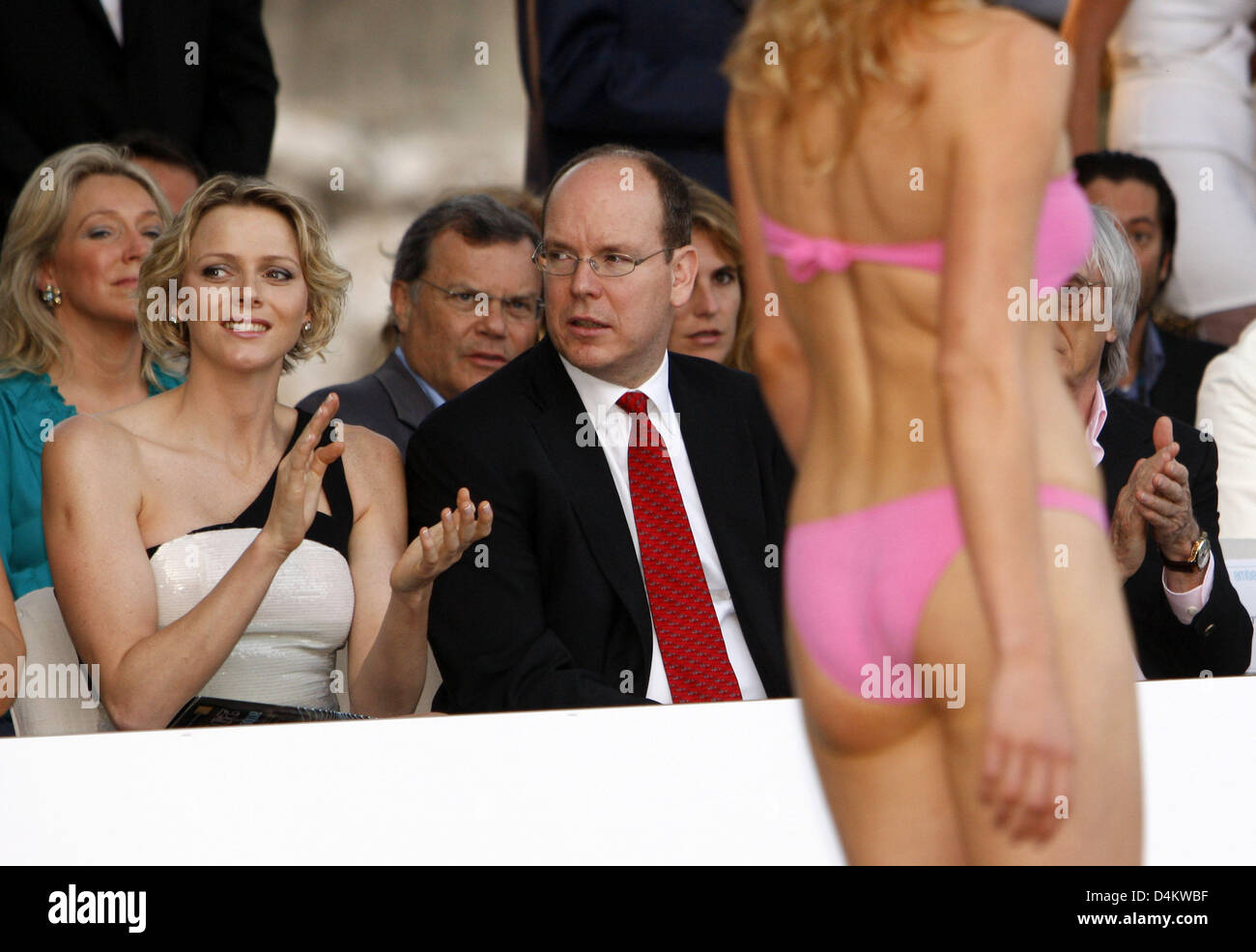 Prince Albert II of Monaco and his girlfriend Charlene Wittstock attend the fashion show of the Petra Ecclestone collection in Monte Carlo, Monaco, 22 May 2009. Petra Ecclestone is the daughter of Formula One boss Bernie Ecclestone. The Formula One Grand Prix of Monaco will take place on 24 May. Photo: JENS BUETTNER Stock Photo