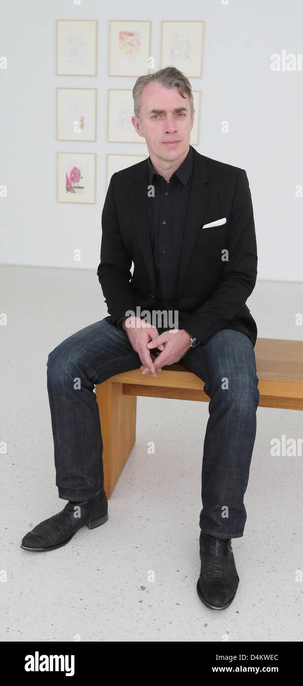 PAinter Neo Rauch sits on a bench at the graphics exhibition Neo Rauch during a press preview in Aschersleben, Germany, 15 March 2013. The second exhibition at Neo Rauch Graphic Foundation will open its doors on 17 September 2013. Rauch spent his childhood and youth in Aschersleben. Photo: JENS WOLF Stock Photo