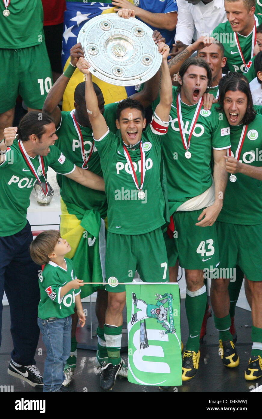 Wolfsburg S Captain Josue C Holds The Championship Shield And Celebrates With The Team After The Bundesliga Soccer Match Vfl Wolfsburg Vs Werder Bremen On The Last Day Of The 2008 2009 Season At