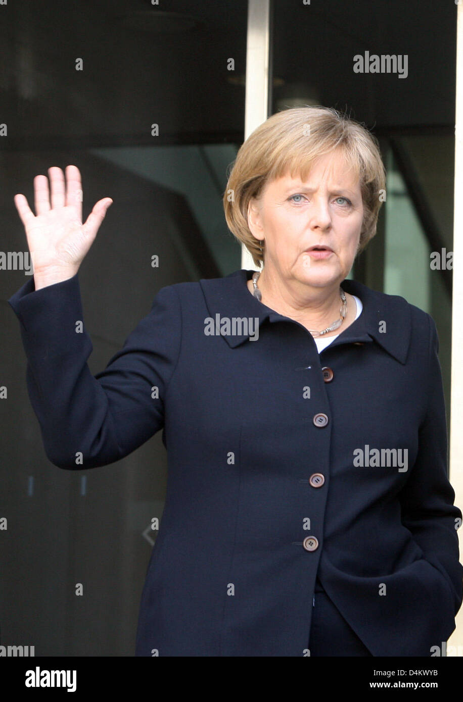German Chancellor Angela Merkel leaves after Federal German President Horst Koehler is reelected by the 13th Federal Convention in the plenar hall of the Reichstag building in Berlin, Germany, 23 May 2009. Koehler won the election with 613 votes, the minimum number of necessary votes. Photo: ALINA NOVOPASHINA Stock Photo
