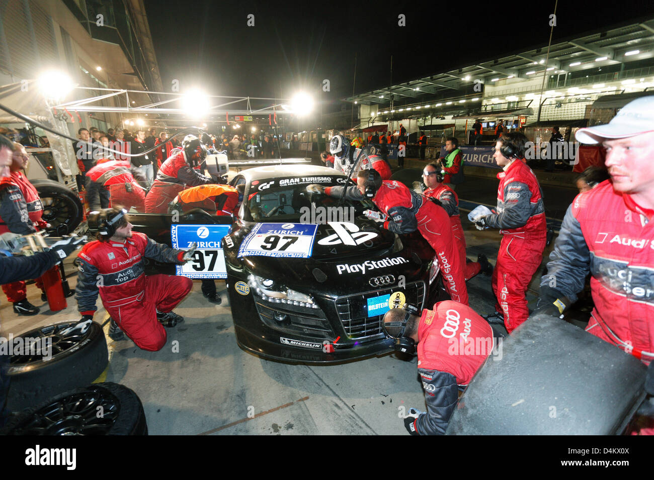 The Audi R8 of Abt-Sportsline Team piloted by Abt, Luhr, Hemboulle and Kaffer is serviced in the pitlane during the Nuerburgring 24 hours race, Nuerburgring, Germany, 24 May 2009. Photo: Thomas Frey Stock Photo