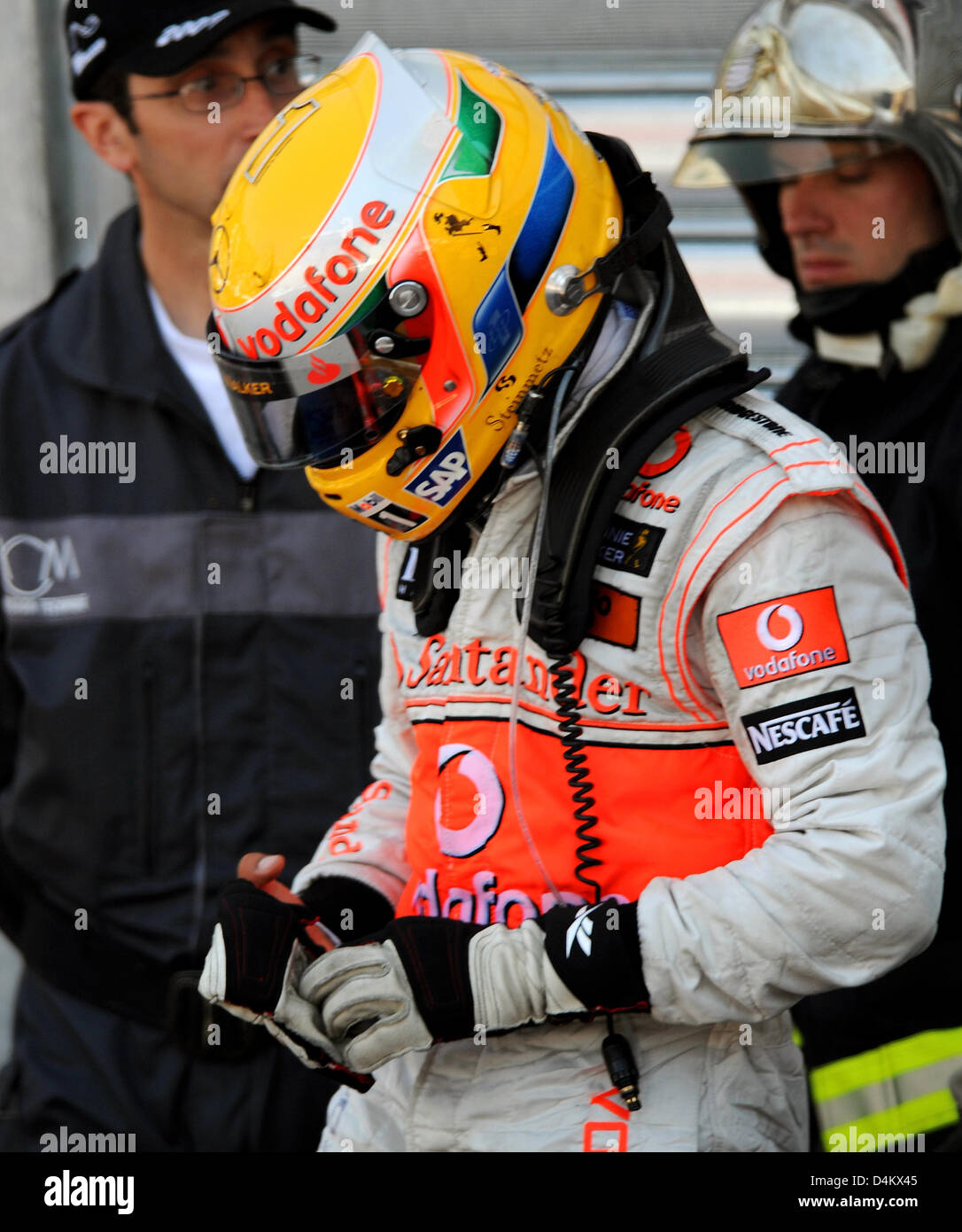 British Formula One driver Lewis Hamilton seen after stepping out of his car after the F1 Grand Prix in Monte Carlo, Monaco, 24 May 2009. Photo: PETER STEFFEN Stock Photo