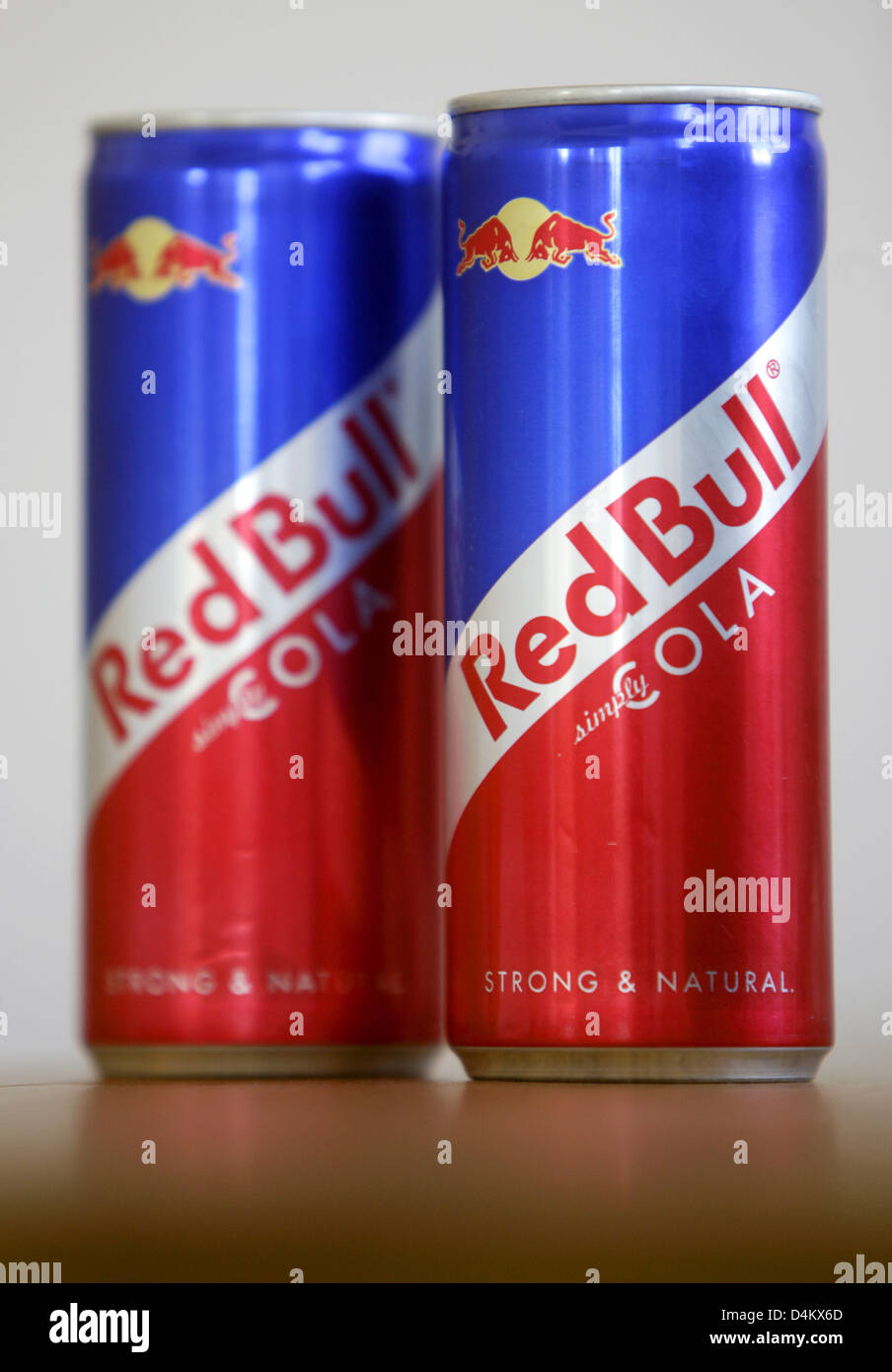The picture shows two cans of Red Bull Coke in Cologne, Germany, 24 May 2009. After the detection of traces of cocaine in the coke of Red Bull, food inspectorates of Hesse, North Rhine Westphalia, Thuringia and Rhineland-Palatinate banned the drink from sale. Photo: Rolf Vennenbernd Stock Photo