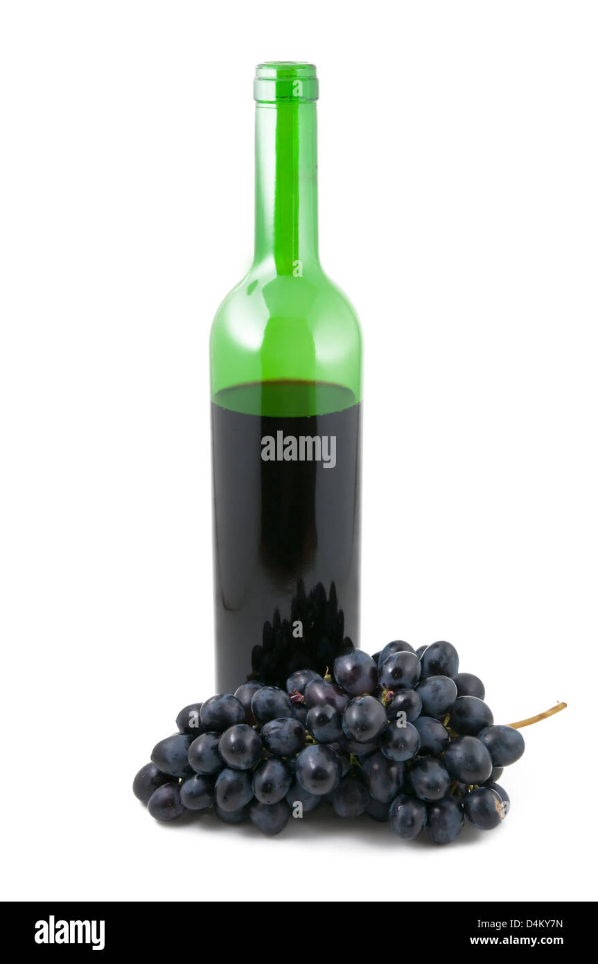 Bottle with wine and a cluster of grapes on the white background Stock Photo