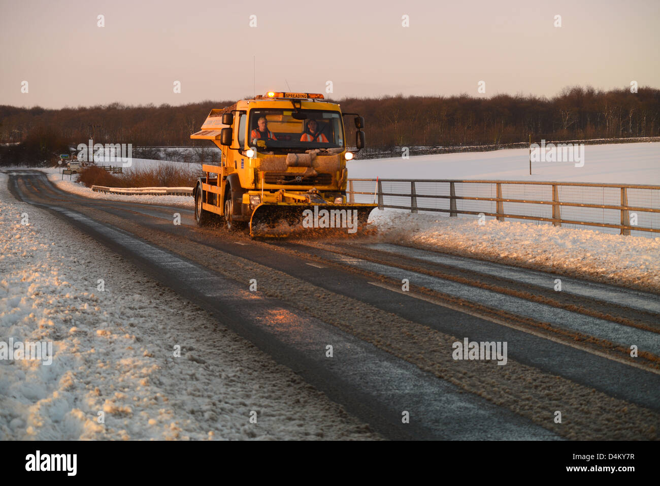 snow plough keeping roads clear of snow and ice in winter time yorkshire uk Stock Photo