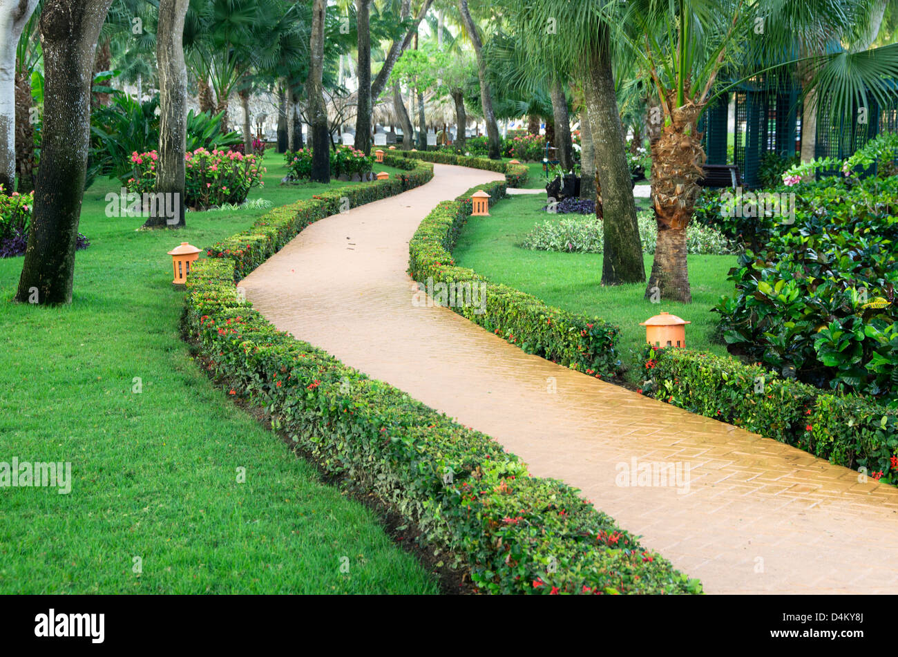 Garden stone path with grass Stock Photo - Alamy