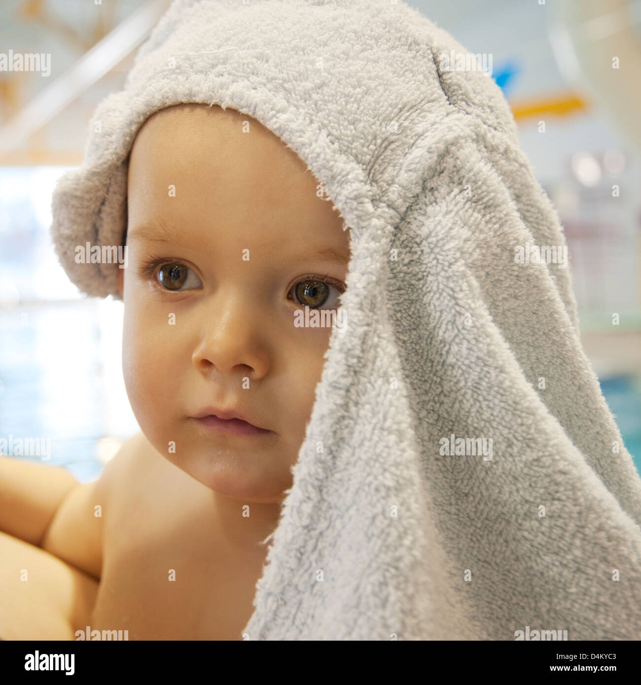 Baby with towel on head Stock Photo Alamy