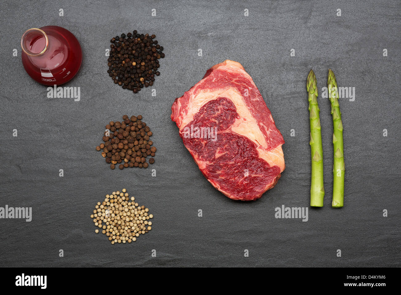 Meat, spices and vegetables on counter Stock Photo Alamy