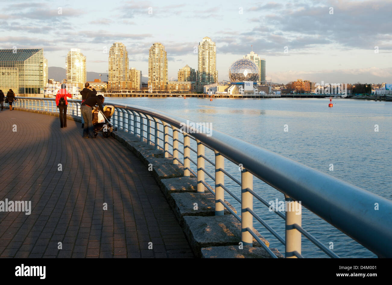 Boardwalk along the water at False Creek, Vancouver, British Columbia, Canada Stock Photo