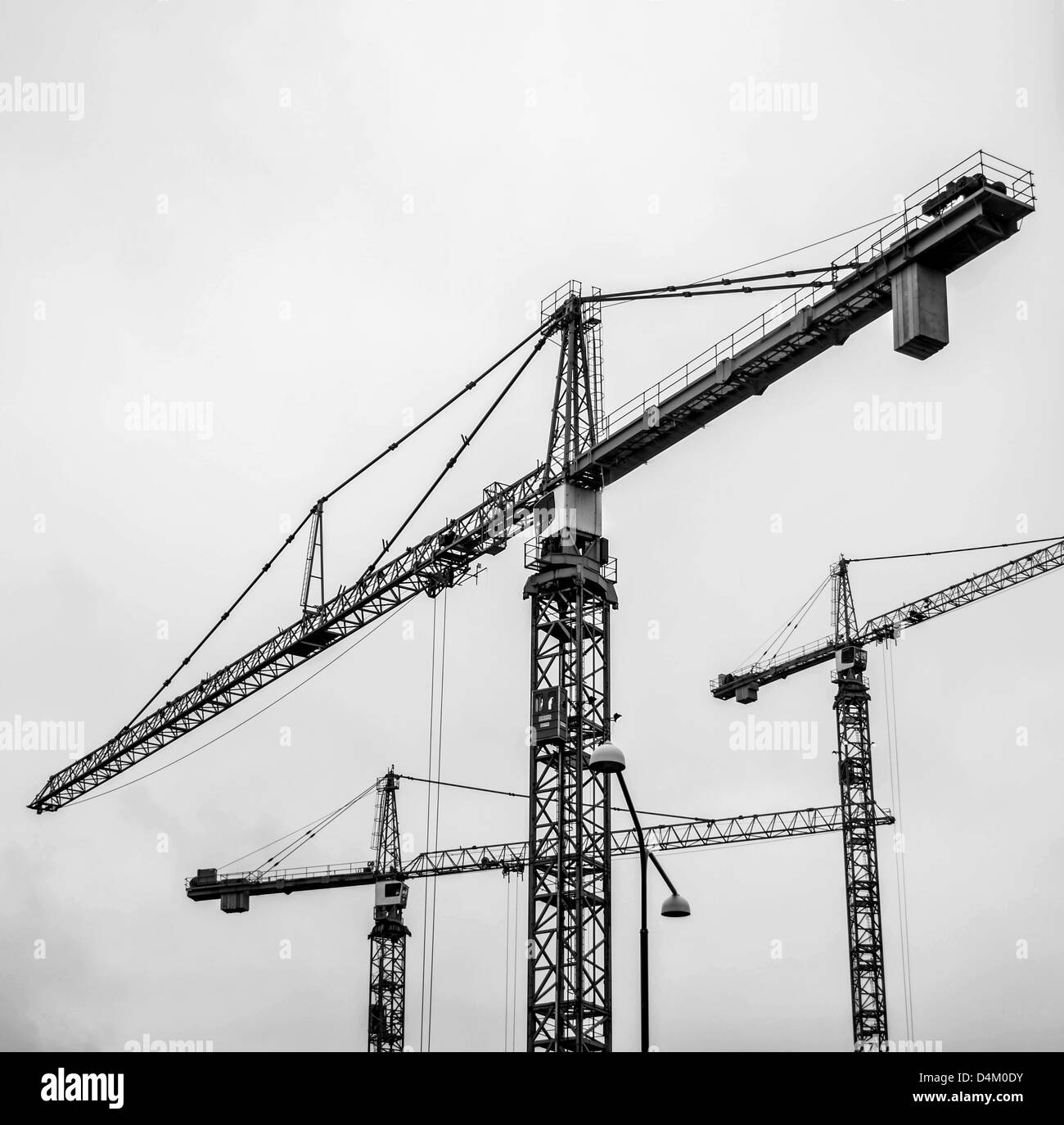 High rise construction with cranes Black and White Stock Photos ...
