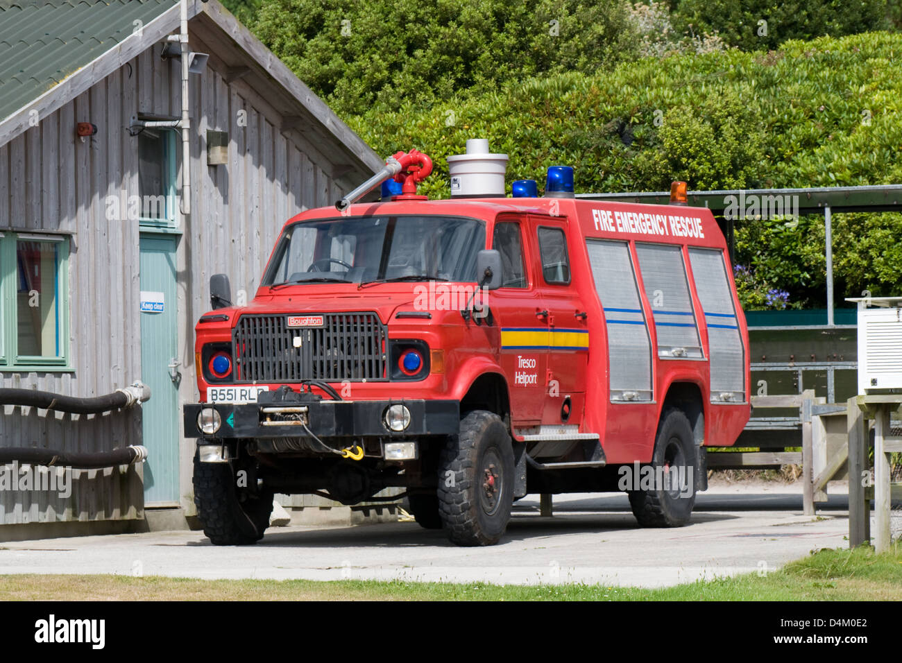 A Broughton 4x4 Fire Engine Is Stationed At Tresco Heliport On The a-broughton-4x4-fire-engine-is-stationed-at-tresco-heliport-on-the
