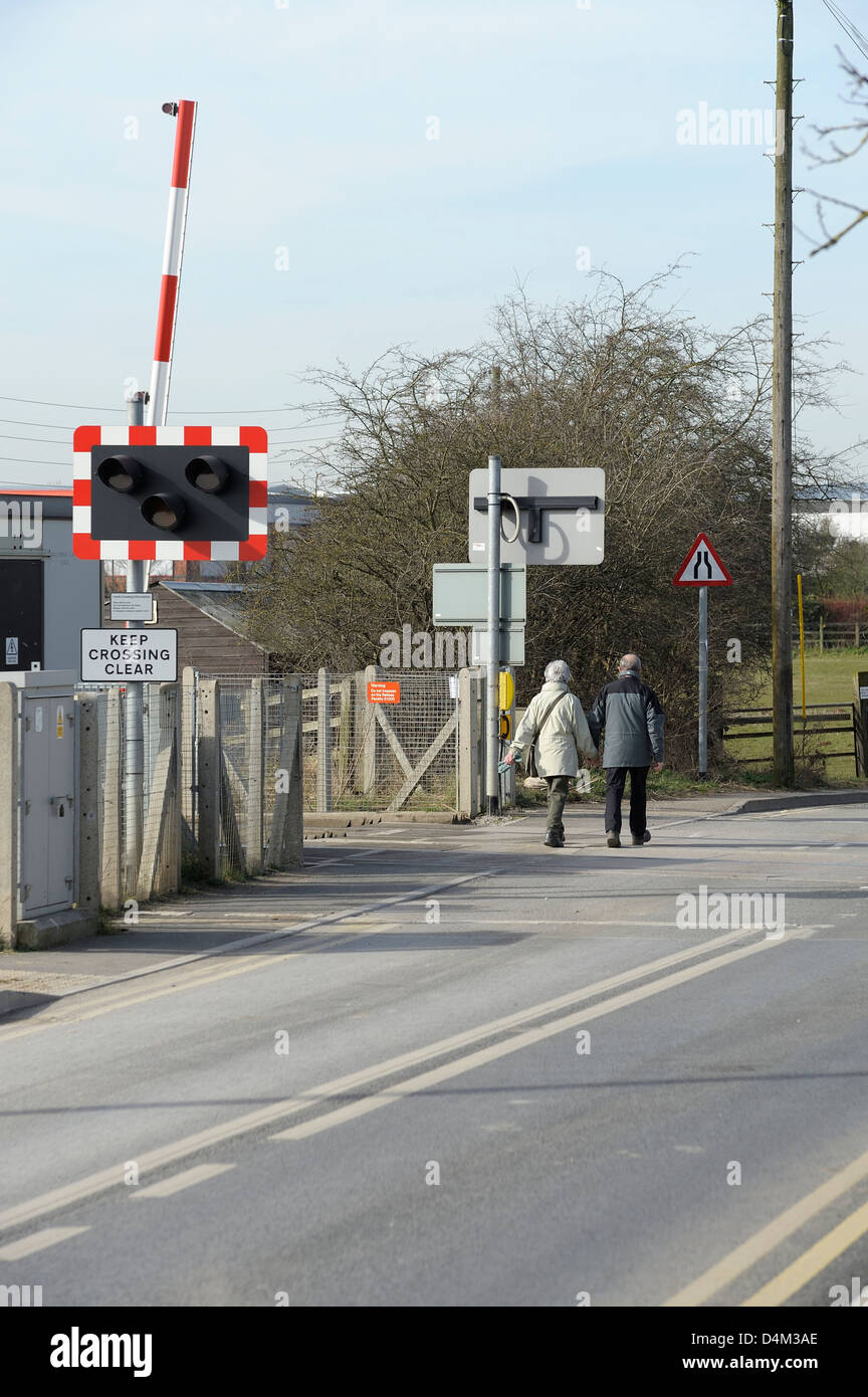 Old Aged Couple Walking Across A Automatic Half Barrier Level Crossing England Uk Stock Photo Alamy Old Aged Couple Walking Across A Automatic Half Barrier Level Crossing England Uk Stock Photo Alamy