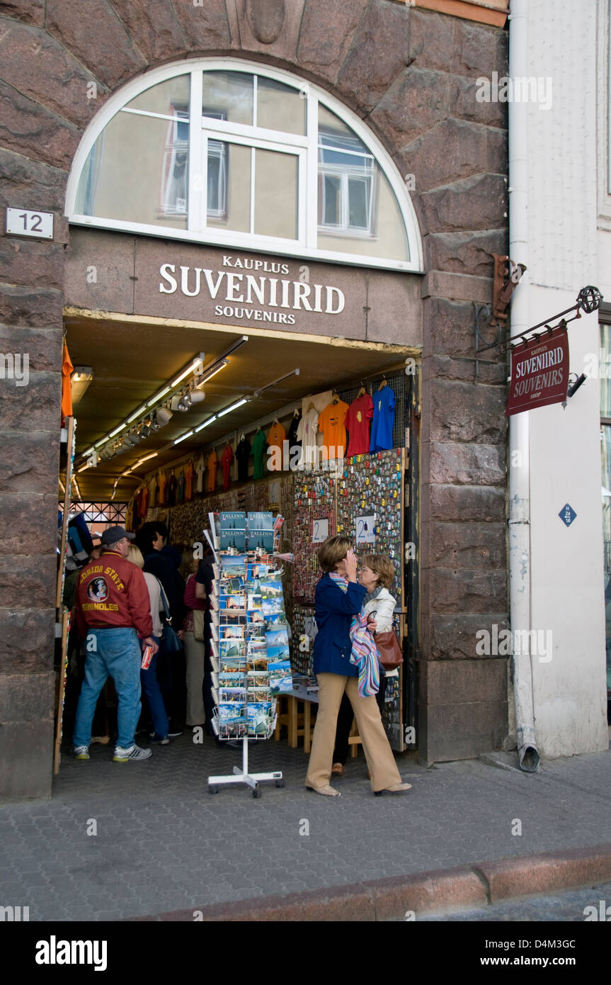 Tourists visit a souvenir shop in an alley beside Viru in Tallinn Old Town, Tallinn, Estonia, Baltic States Stock Photo