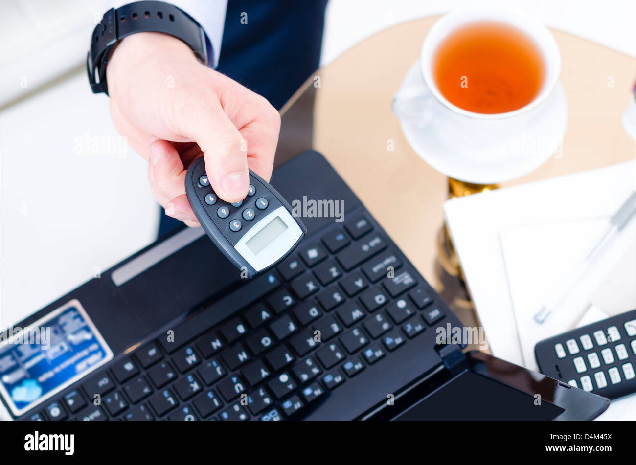 A close look to somebody using internet banking Stock Photo