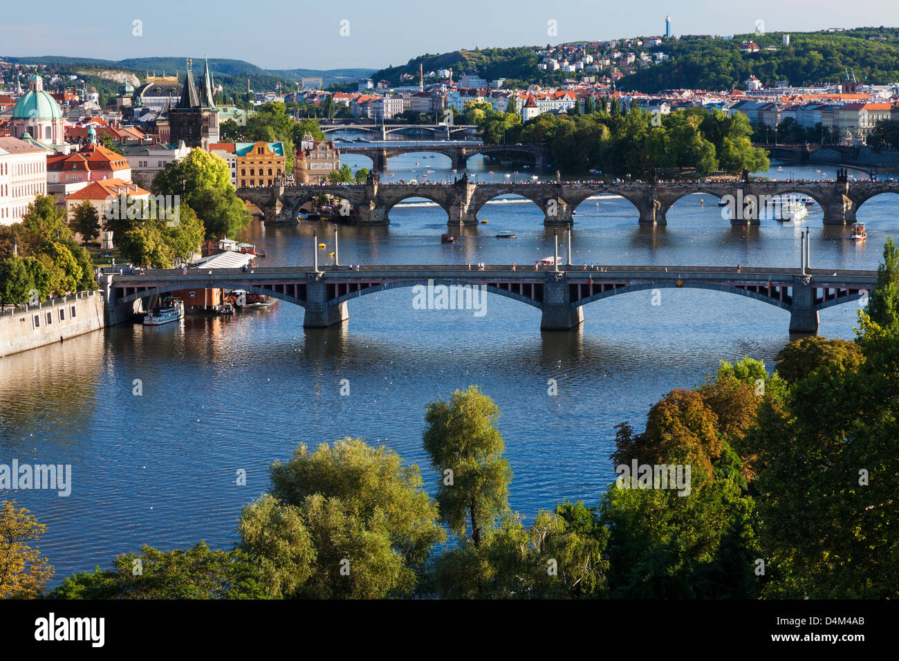 View of Prague and bridges over river Vltava (Moldau) Czech Republic. Famous Charles Bridge is second from bottom. Stock Photo