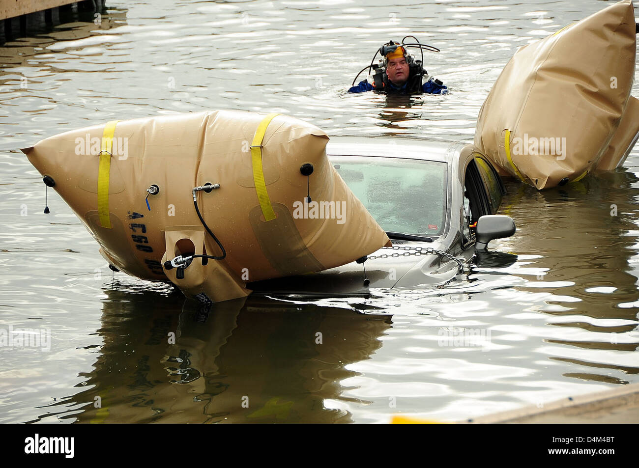 Vehicle removed from Oakland Estuary Stock Photo