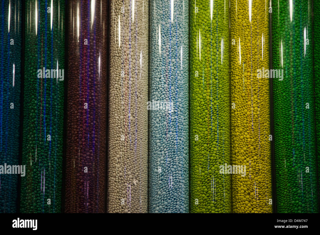 M&Ms sweets in plastic dispenser tubes in the M&M shop in New York