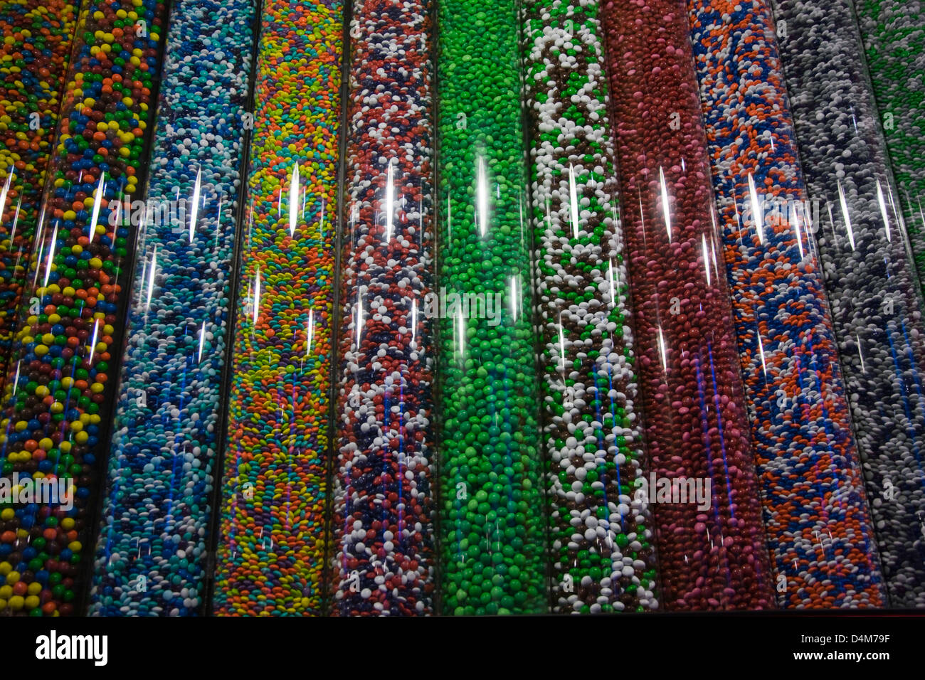 M&Ms sweets in plastic dispenser tubes in the M&M shop in New York Stock Photo