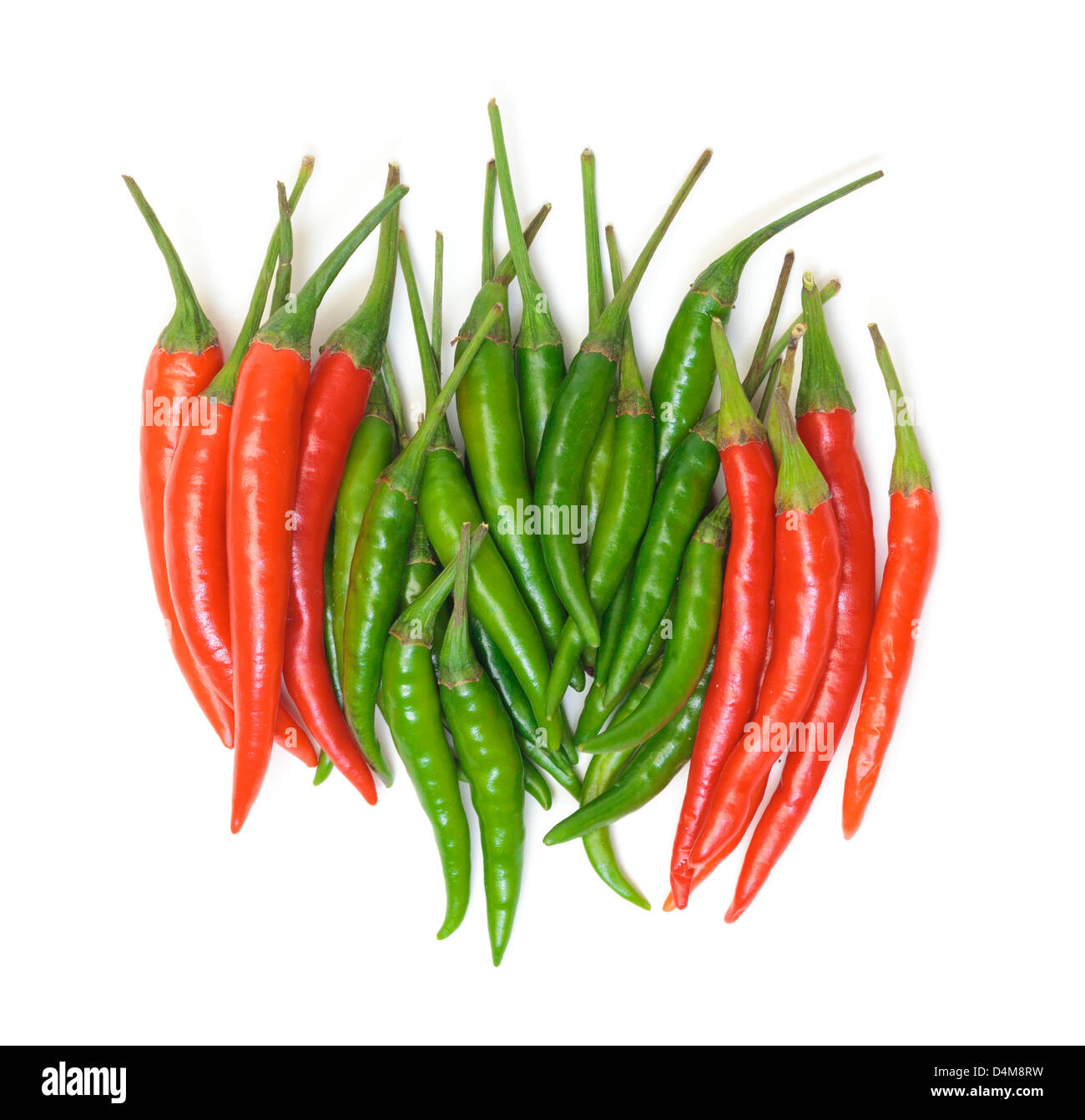 Heap Red and Green Chilli Hot Peppers on white background Stock Photo