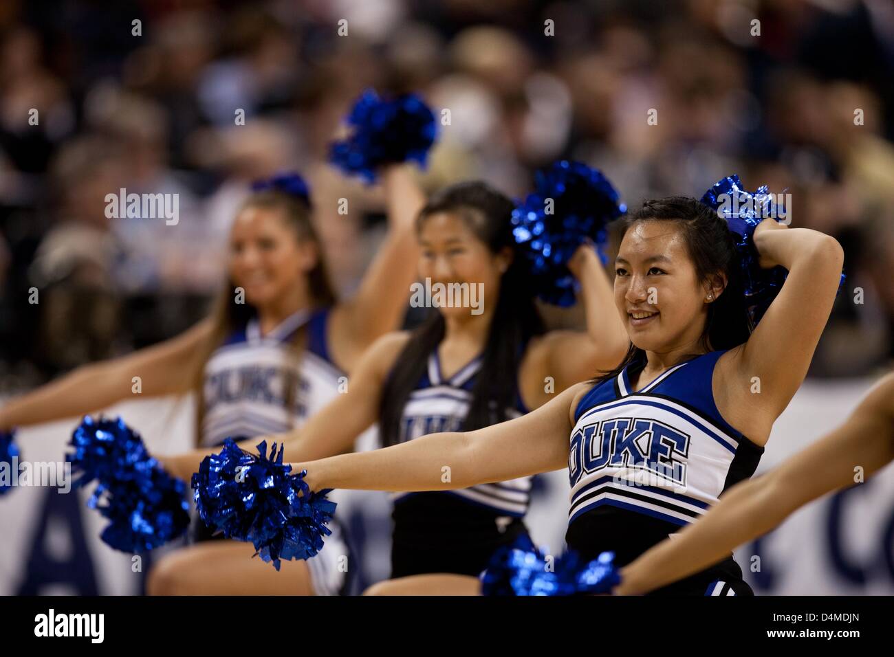 March 15, 2013 - Greensboro, North Carolina, United States of America - March 15, 2013: Duke cheerleaders on the court during the Maryland vs Duke game at the 2013 ACC men's basketball tournament in Greensboro, NC at the Greensboro Coliseum on March 15, 2013. Duke defeated Maryland 83-74. Stock Photo