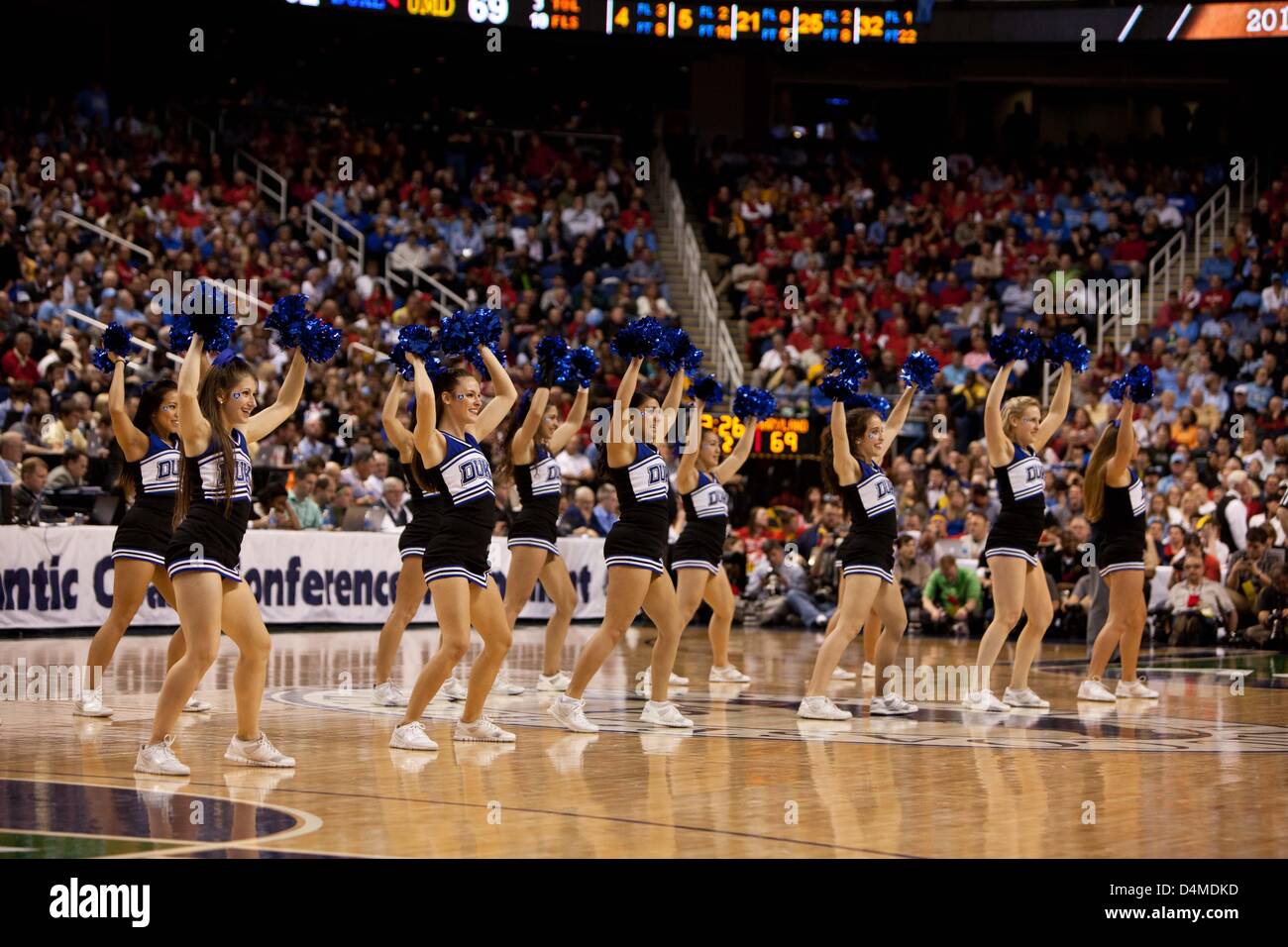 March 15, 2013 - Greensboro, North Carolina, United States of America - March 15, 2013: Duke cheerleaders on the court during the Maryland vs Duke game at the 2013 ACC men's basketball tournament in Greensboro, NC at the Greensboro Coliseum on March 15, 2013. Duke defeated Maryland 83-74. Stock Photo