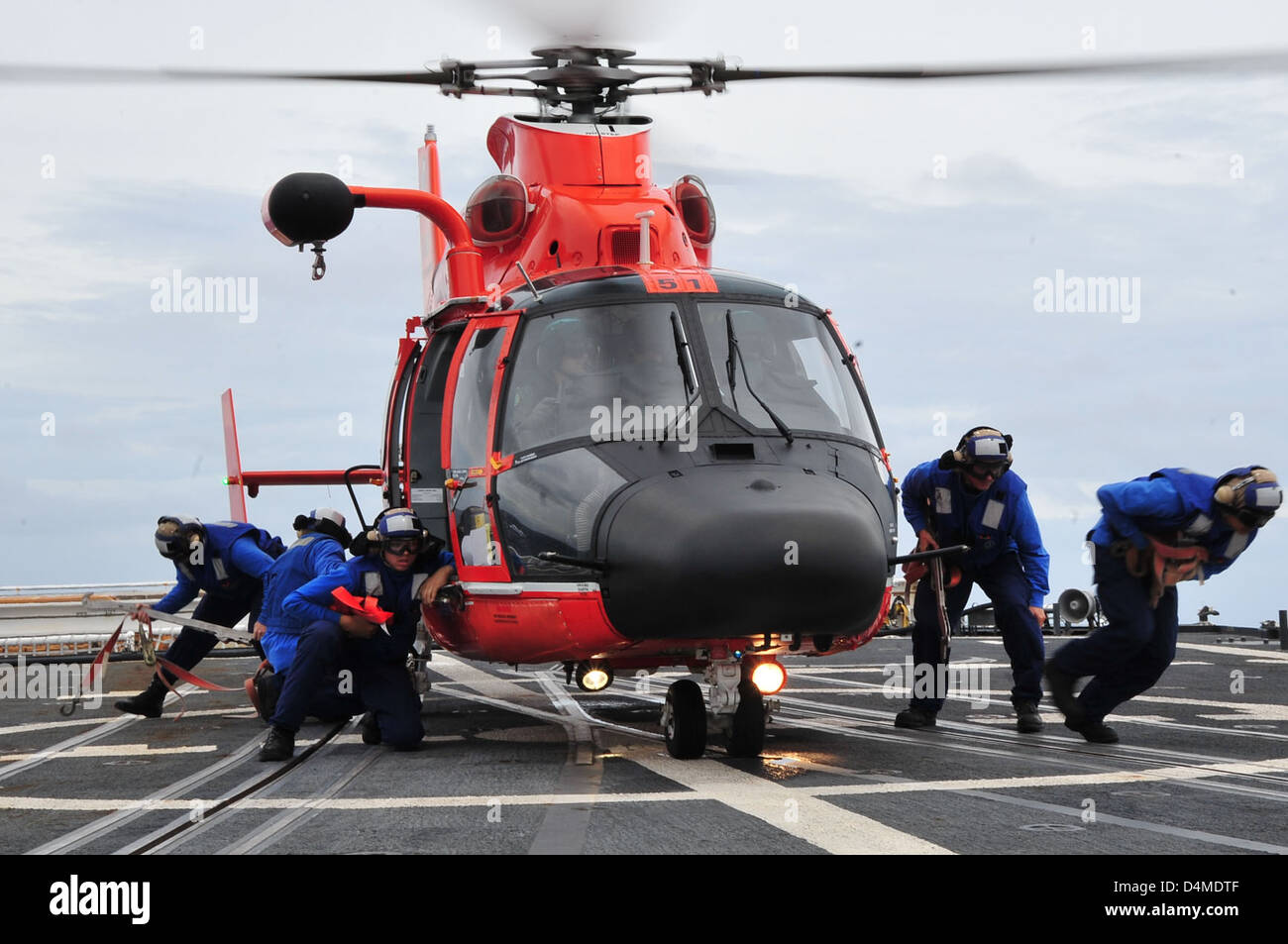 Helicopter tiedown team Stock Photo Alamy