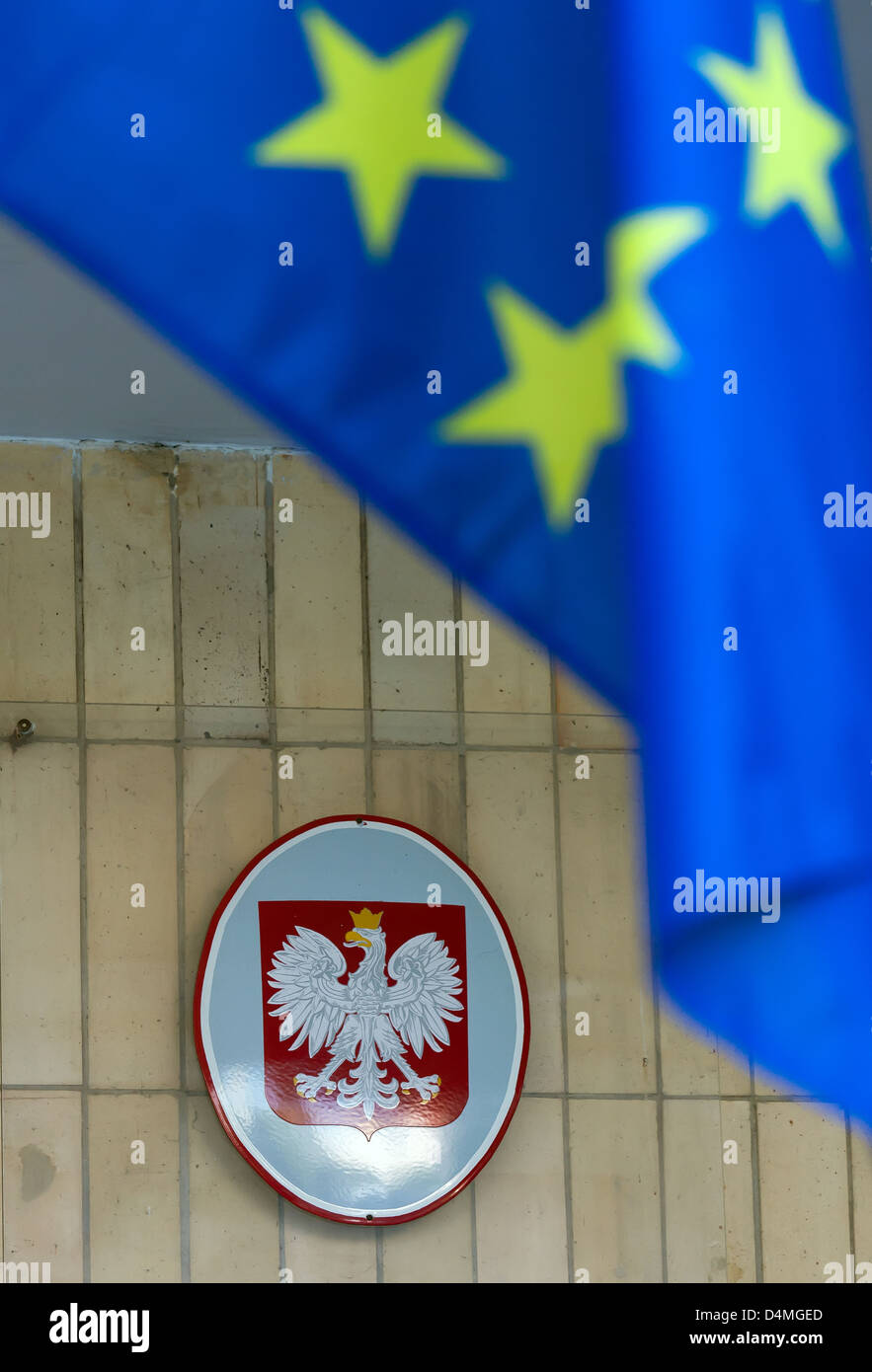 Opole, Poland, EU flag and coat of arms of Poland at the seat of self-government of the Opole Stock Photo