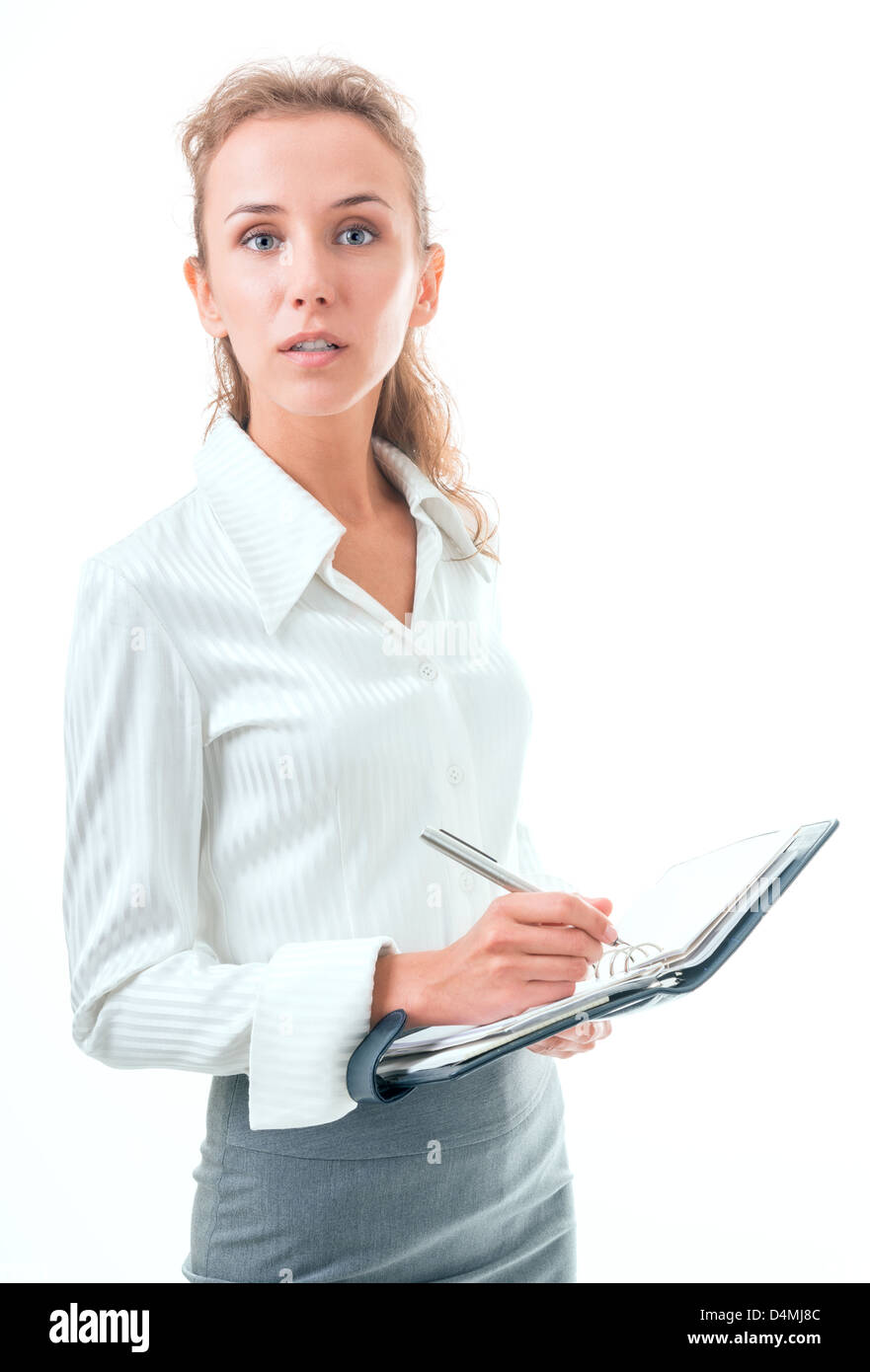 young woman in office attire. The figure is isolated on a white background with the clipping path Stock Photo