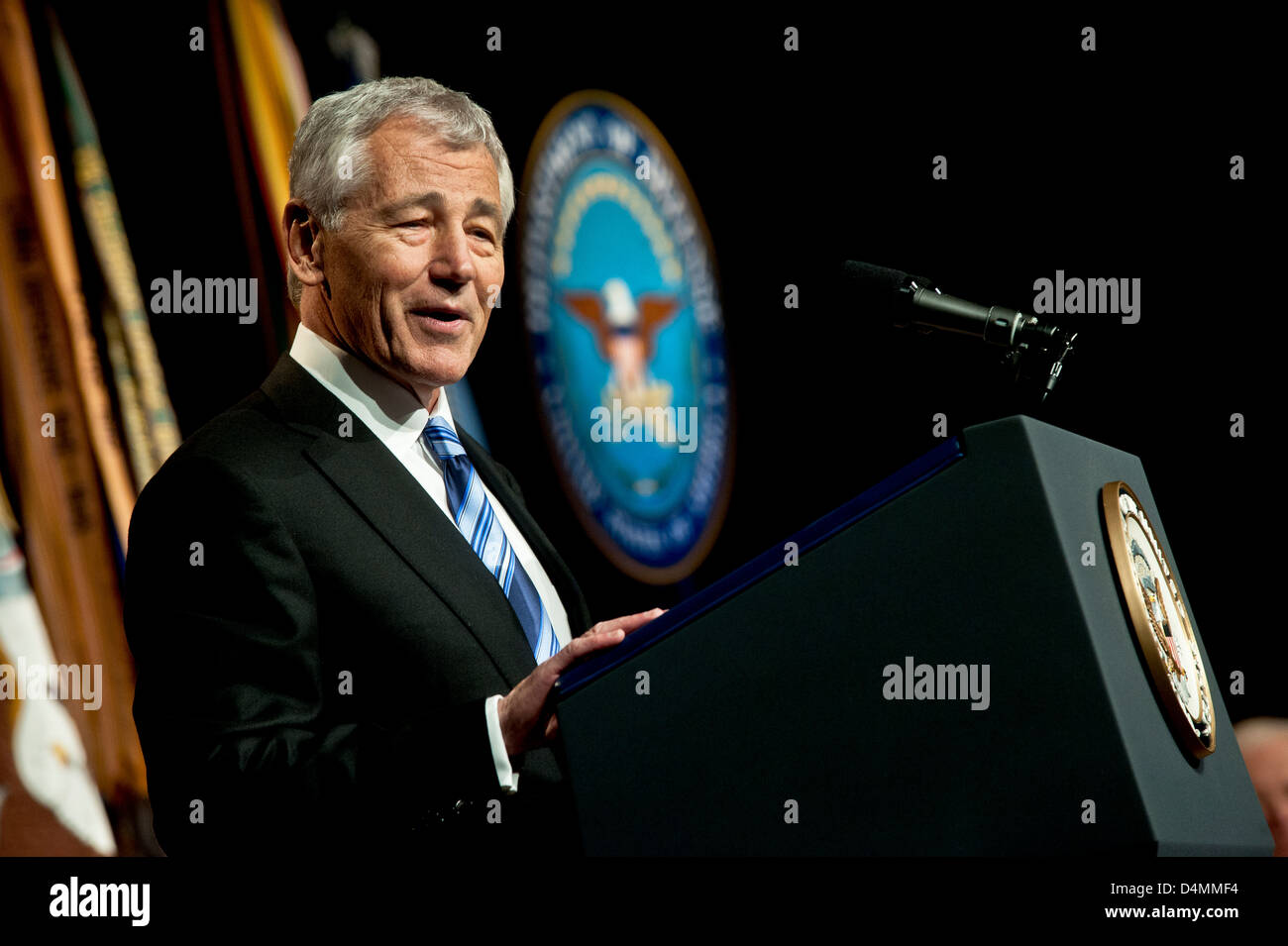 US Defense Secretary Chuck Hagel addresses an audience after taking the oath of office from Vice President Joe Biden during a ceremonial swearing in at the Pentagon March 14, 2013 in Arlington, VA. Stock Photo