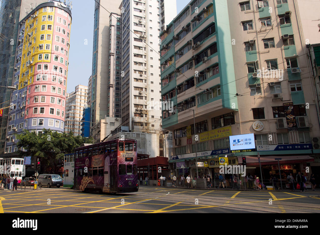 Street scene in Wan Chai. Busy intersection in Wan Chai with trams ...