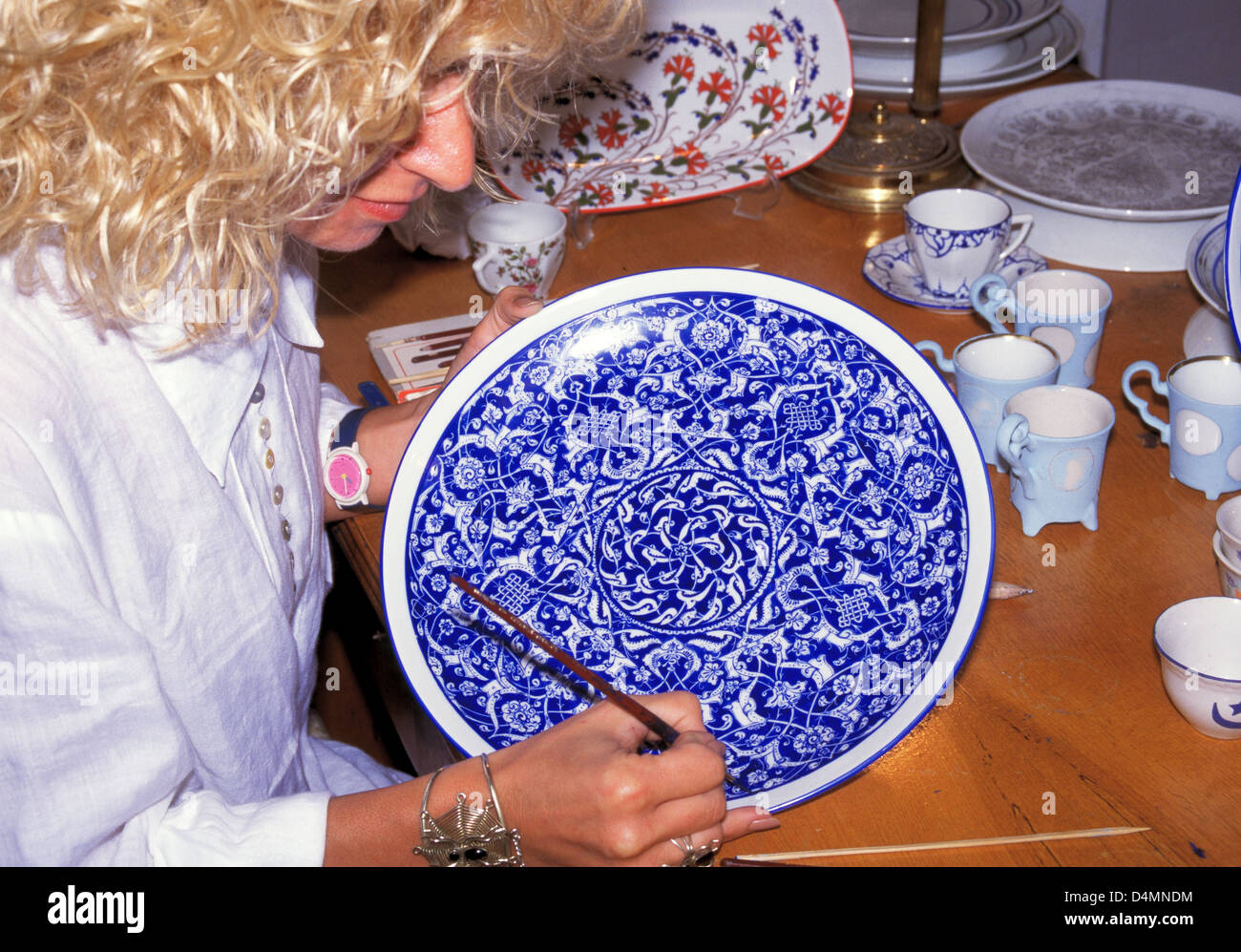 Ceramic painter in the Courtyard of Arts & Crafts, Istanbul, Turkey