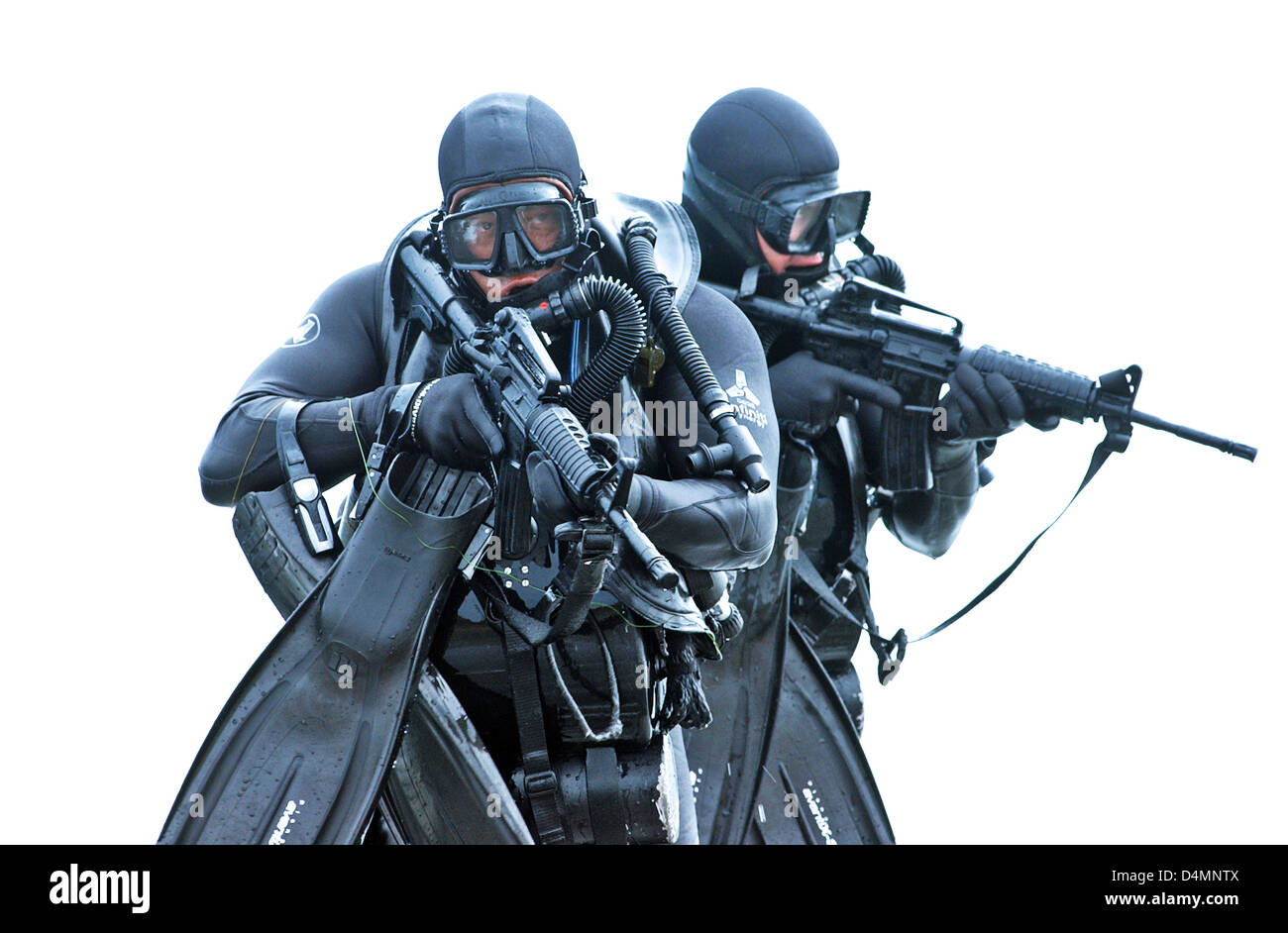 Members of a SEAL Team practice water insertion techniques in SCUBA gear May 25, 2004 at the Navy Special Warfare Center, Coronado, CA. Stock Photo