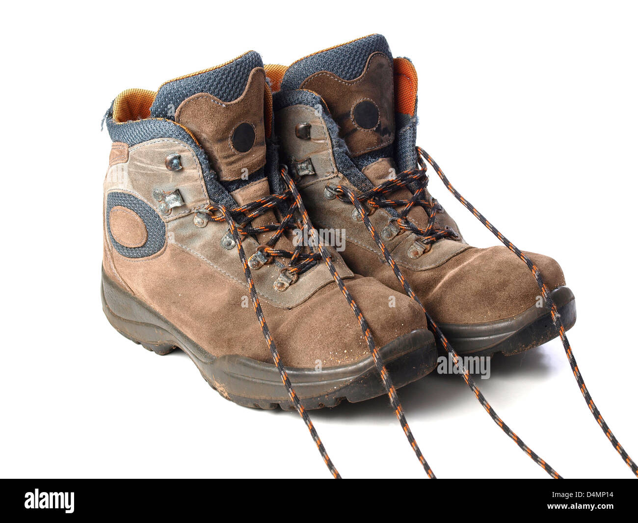 A pair of trekking boots isolated on white background Stock Photo - Alamy