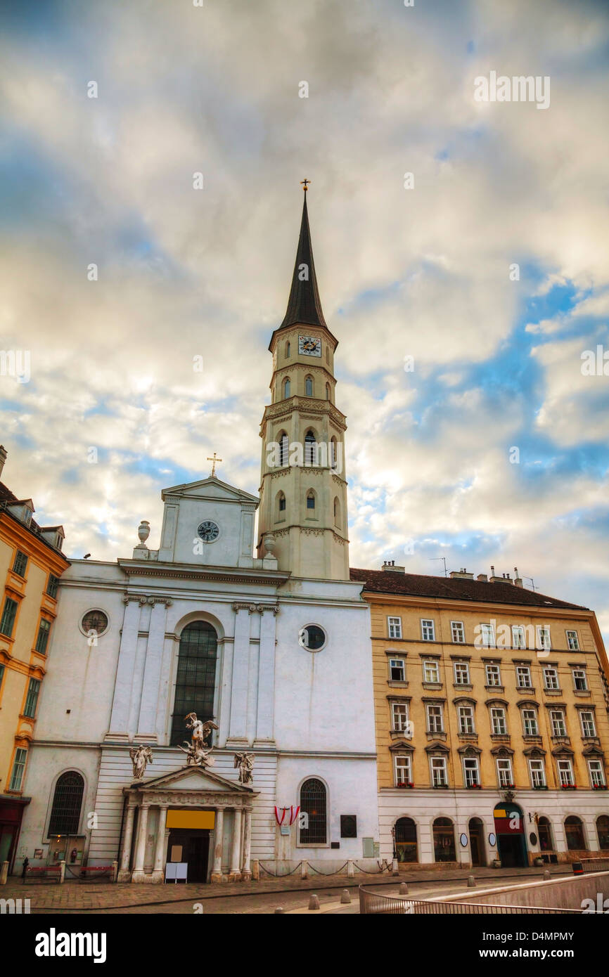 St. Michael's Church (Michaelerkirche) in Vienna at sunrise Stock Photo