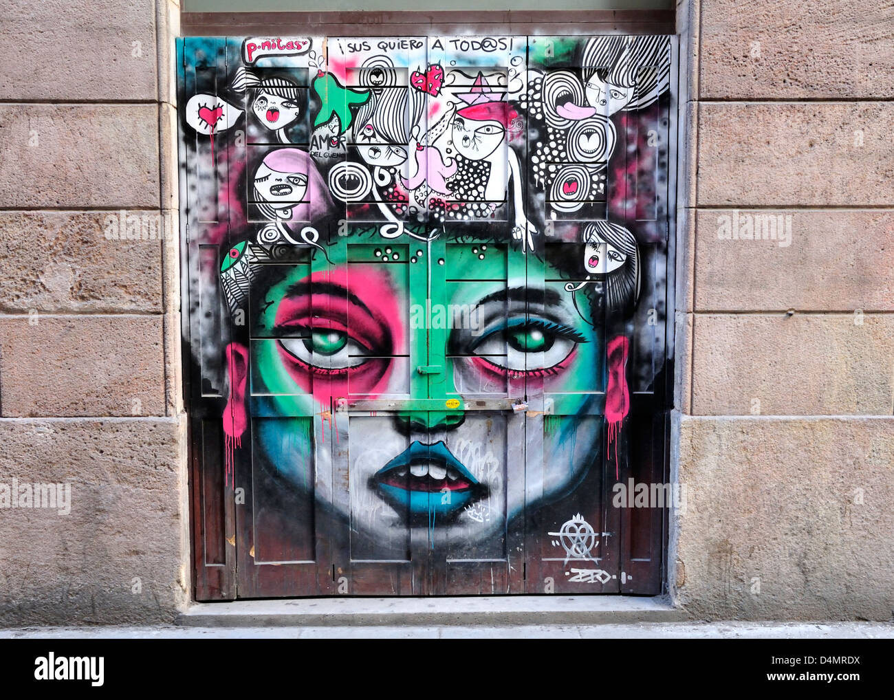 Barcelona, Catalonia, Spain. Painted shop shutters reflecting the business. Stock Photo