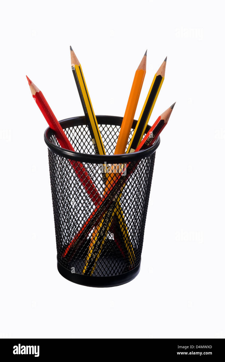 Pencils in a black mesh stand. Stock Photo