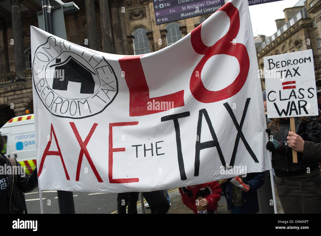 Liverpool, UK. Saturday 16th March 2013. Axe the Tax banner and a sign saying 'Bedroom Tax = Class War'.  As part of nationwide protests, campaigners gathered in Liverpool city centre to demonstrate against a new 'bedroom tax' that will cut benefits to people with a spare room. Credit: David Colbran/Alamy Live News Stock Photo