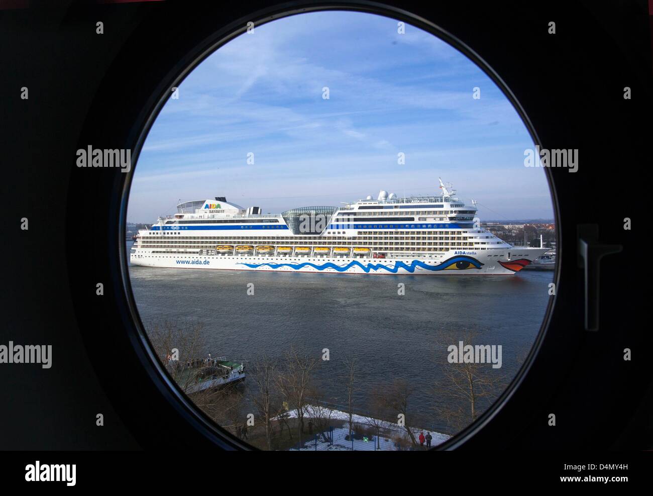 The newly built cruise ship 'AIDAstella' arrives to the port of Rostock, Germany, 16 March 2013. The new 2.200 passenger club ship has 14 decks and equals her sister ships AIDAblu, AIDAsol and AIDAmar also in respect to size. Photo: Jens Buettner Stock Photo