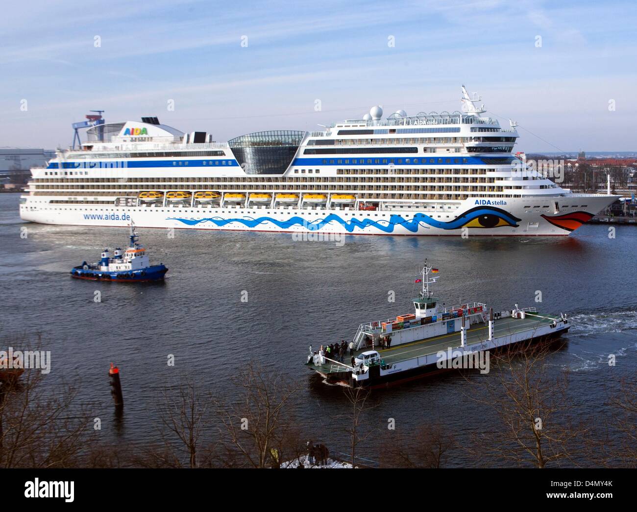 The newly built cruise ship 'AIDAstella' arrives to the port of Rostock, Germany, 16 March 2013. The new 2.200 passenger club ship has 14 decks and equals her sister ships AIDAblu, AIDAsol and AIDAmar also in respect to size. Photo: Jens Buettner Stock Photo
